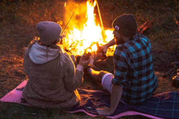 20+ Campfire Games for Couples You’ll Love Playing 🔥